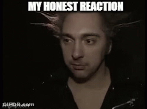 A Close Up Of A Man 'S Face With The Words My Honest Reaction GIF