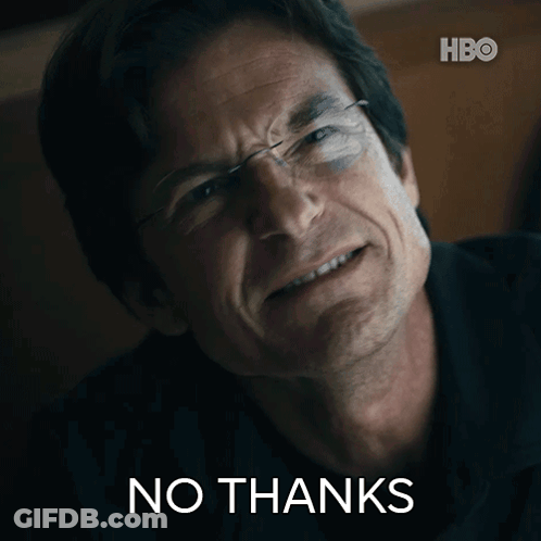 A Close Up Of A Man 'S Face With The Words " No Thanks " On The Bottom GIF