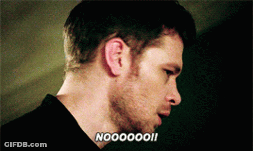 A Close Up Of A Man 'S Face With The Words " Noooooo " Written On The Bottom GIF