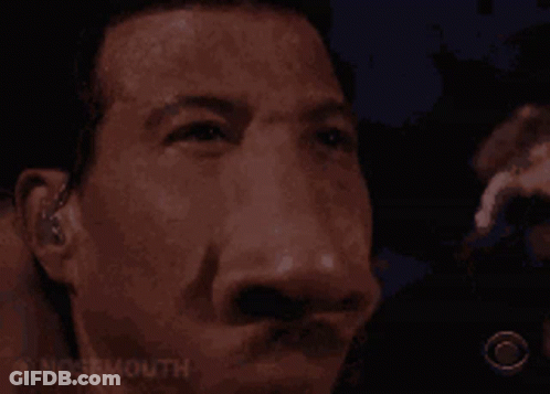 A Close Up Of A Man 'S Face With The Words Nosemouth Written On The Bottom GIF