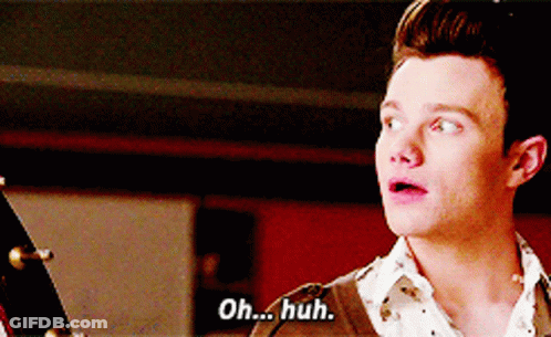 A Close Up Of A Man 'S Face With The Words Oh Huh On The Bottom GIF