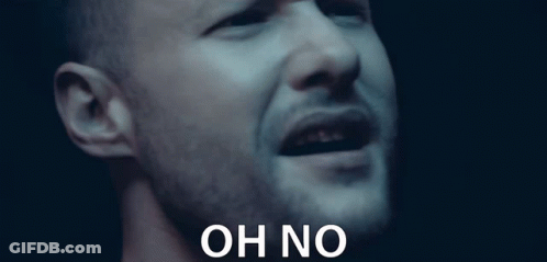 A Close Up Of A Man 'S Face With The Words Oh No Written Below Him GIF