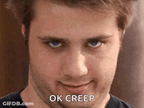 A Close Up Of A Man 'S Face With The Words Ok Creep Written On It GIF