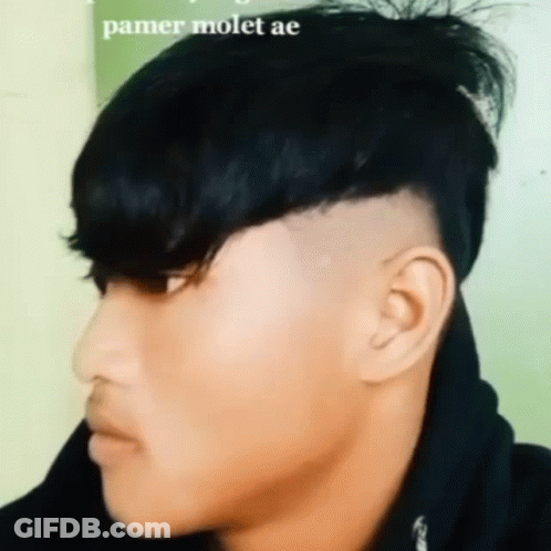 A Close Up Of A Man 'S Face With The Words Pamer Molet Ae In The Corner GIF