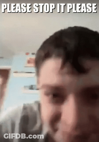 A Close Up Of A Man 'S Face With The Words Please Stop It Please Written Above It GIF