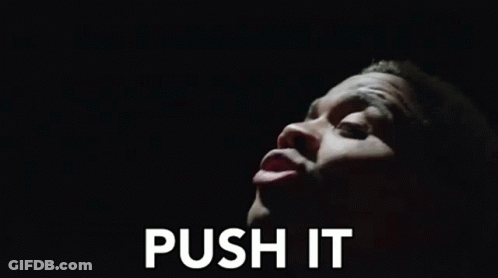 A Close Up Of A Man 'S Face With The Words `` Push It '' Written On The Bottom . GIF