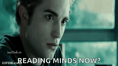 A Close Up Of A Man 'S Face With The Words Reading Minds Now Written On It . GIF