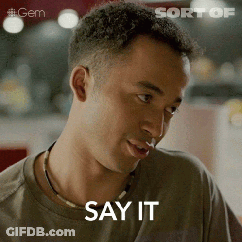 A Close Up Of A Man 'S Face With The Words Say It Written On It GIF