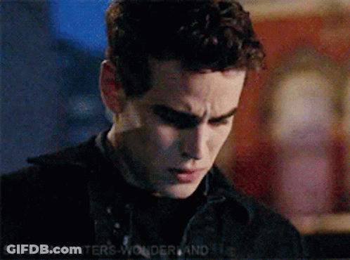 A Close Up Of A Man 'S Face With The Words Shadowhunters Wonderland In The Corner GIF