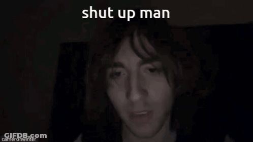 A Close Up Of A Man 'S Face With The Words Shut Up Man Written Above Him GIF