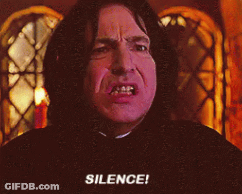 A Close Up Of A Man 'S Face With The Words Silence Written Below It GIF
