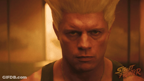 A Close Up Of A Man 'S Face With The Words Street Fighter On The Bottom Right GIF