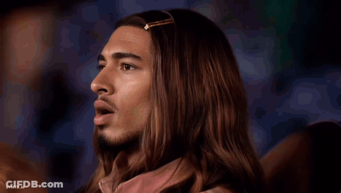 A Close Up Of A Man 'S Face With The Words Syntx.ai At The Bottom GIF