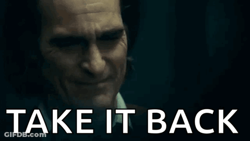 A Close Up Of A Man 'S Face With The Words `` Take It Back '' Written On It . GIF