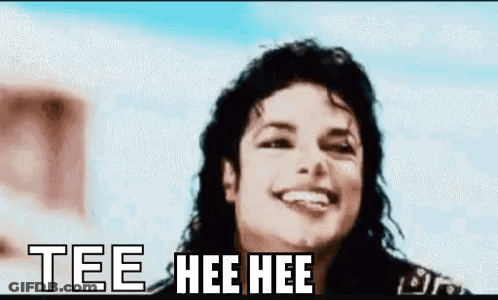 A Close Up Of A Man 'S Face With The Words Tee Hee Hee Written On It . GIF