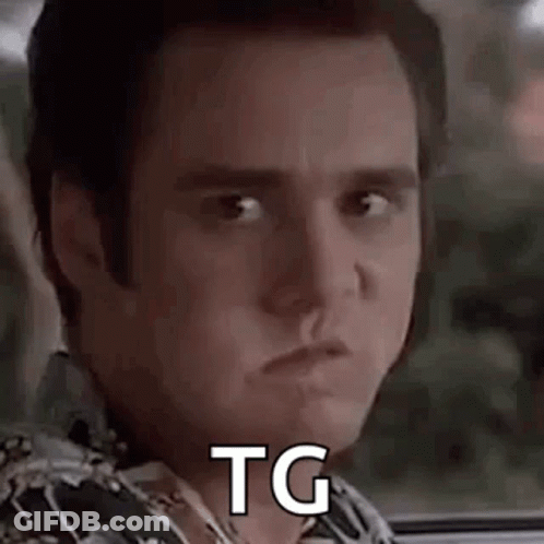 A Close Up Of A Man 'S Face With The Words `` Tg '' Written On His Face . GIF