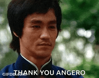 A Close Up Of A Man 'S Face With The Words Thank You Angero Below Him GIF