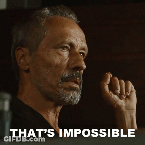 A Close Up Of A Man 'S Face With The Words That 'S Impossible GIF