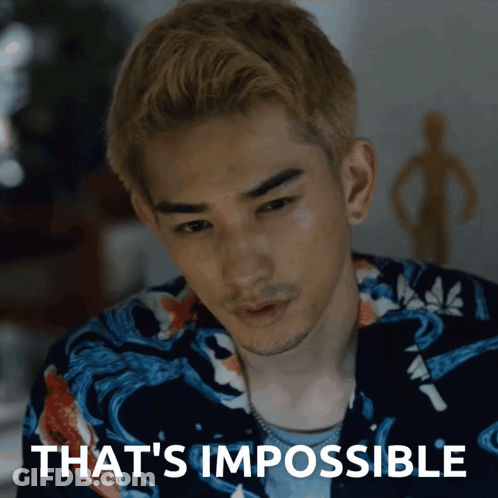 A Close Up Of A Man 'S Face With The Words That 'S Impossible Above Him GIF