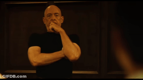 A Close Up Of A Man 'S Face With The Words " The Chess Game " On The Bottom GIF