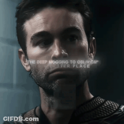 A Close Up Of A Man 'S Face With The Words " The Deep Mogging To Oblivion " Visible GIF