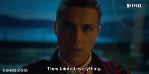 A Close Up Of A Man 'S Face With The Words They Tainted Everything Next To Him GIF