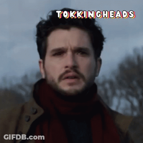 A Close Up Of A Man 'S Face With The Words " Tokingheads " Above Him GIF
