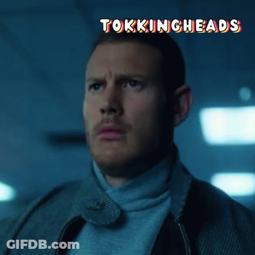 A Close Up Of A Man 'S Face With The Words " Tokingheads " Above Him GIF
