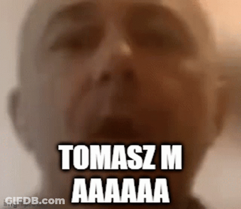A Close Up Of A Man 'S Face With The Words Tomasz M Aaaaa GIF