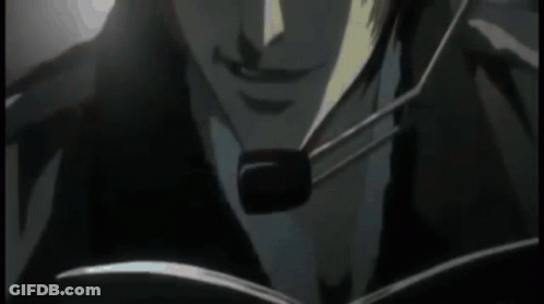 Close Up Of Man's Face With Translator's Note Keikaku Means Plan GIF