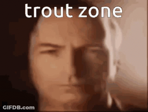 A Close Up Of A Man 'S Face With The Words Trout Zone Written Above Him GIF