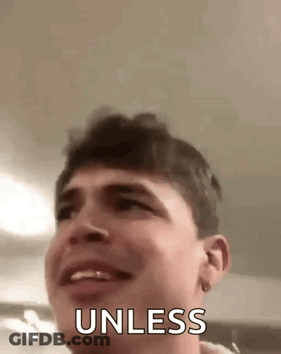 A Close Up Of A Man 'S Face With The Words `` Unless '' Written Next To Him . GIF