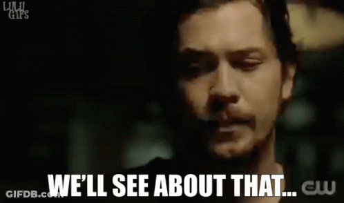 A Close Up Of A Man 'S Face With The Words `` We 'Ll See About That '' Written Below Him . GIF