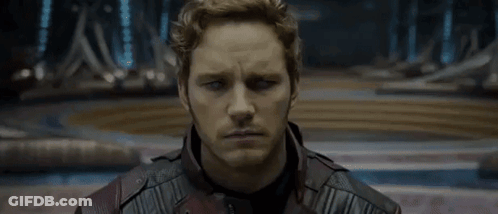 A Close Up Of A Man 'S Face With The Words `` What '' Written On The Bottom . GIF