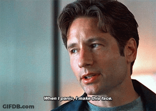 A Close Up Of A Man 'S Face With The Words When I Panic I Make This Face GIF