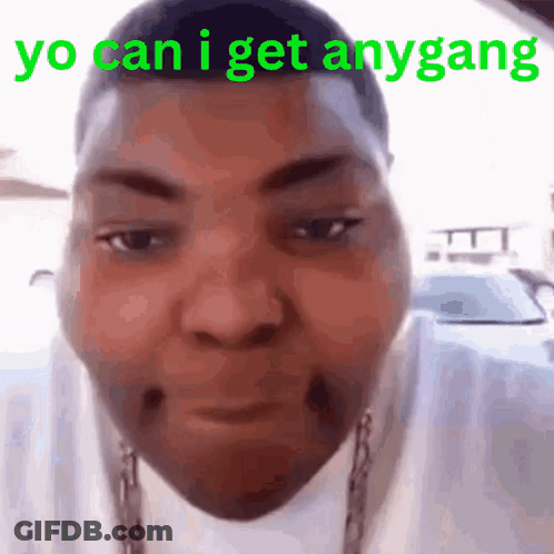 A Close Up Of A Man 'S Face With The Words Yo Can I Get Anygang Written In Green . GIF