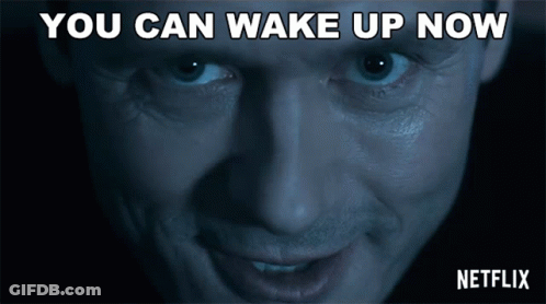 A Close Up Of A Man 'S Face With The Words You Can Wake Up Now Above Him GIF