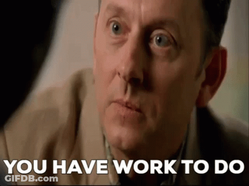 A Close Up Of A Man 'S Face With The Words `` You Have Work To Do '' Written On It . GIF