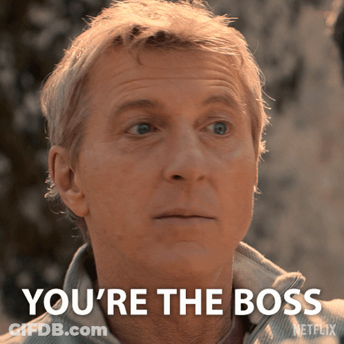 A Close Up Of A Man 'S Face With The Words " You 'Re The Boss " GIF