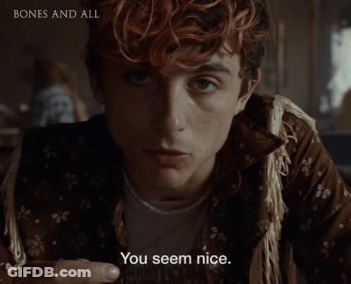 A Close Up Of A Man 'S Face With The Words " You Seem Nice " On The Bottom GIF