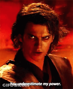 A Close Up Of A Man 'S Face With The Words You Underestimate My Power GIF