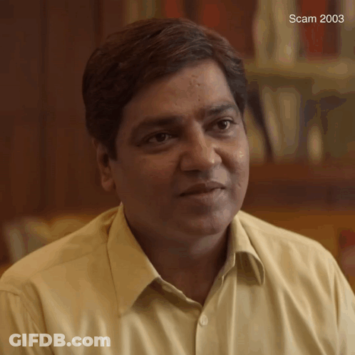 A Close Up Of A Man 'S Face With The Year 2003 On The Bottom Left GIF