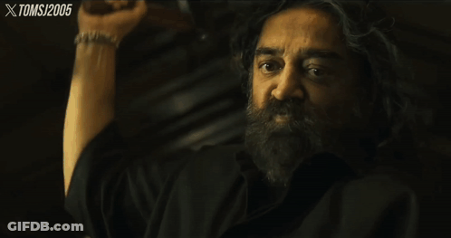 A Close Up Of A Man 'S Face With The Year 2005 On The Bottom Right Corner GIF