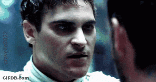 A Close Up Of A Man 'S Face With The Year 2022 Visible GIF