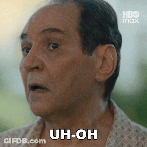 A Close Up Of A Man 'S Face With Uh-Oh Written On His Face GIF