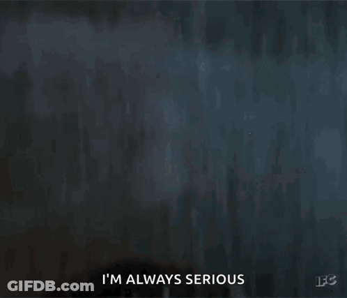 A Close Up Of A Man 'S Face With Water Drops On It And The Words I 'M Always Serious . GIF
