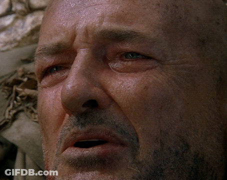A Close Up Of A Man 'S Face With Water On His Face GIF