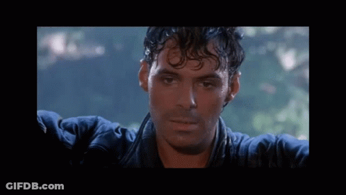 A Close Up Of A Man 'S Face With Water On His Face GIF