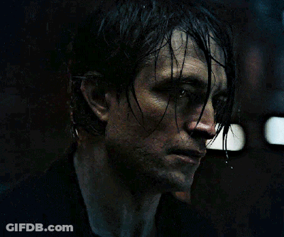 A Close Up Of A Man 'S Face With Wet Hair On It GIF