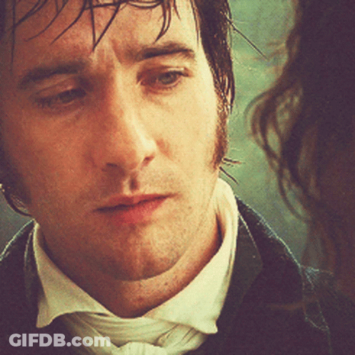 A Close Up Of A Man 'S Face With Wet Hair GIF